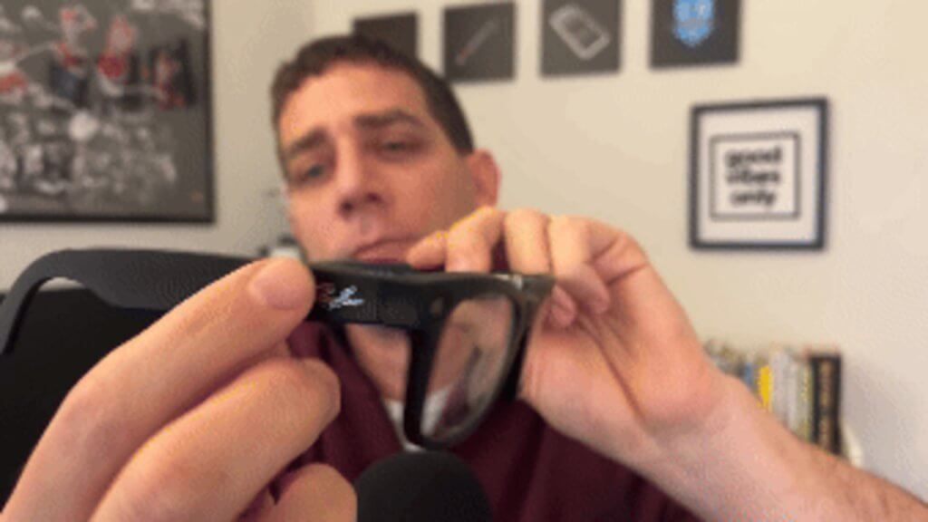 Idan is holding a RayBan Meta Smart Glasses