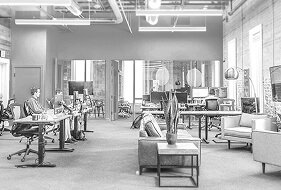 Open office workspace with employees