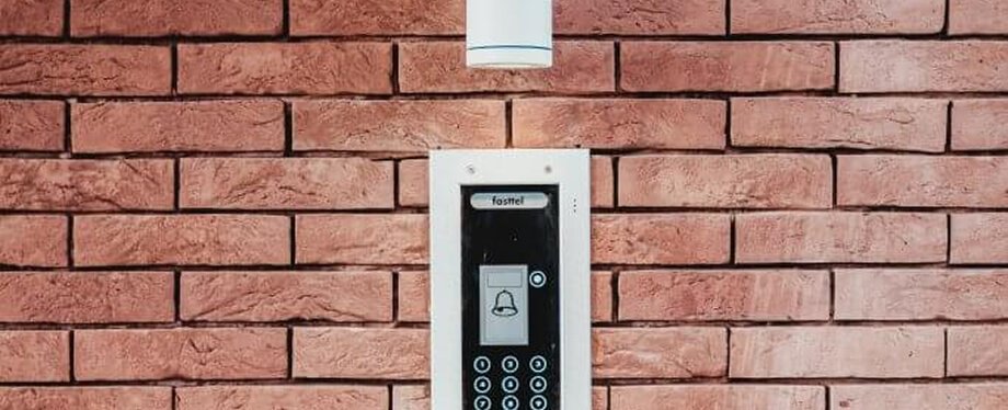 RightHear bluetooth beacon installed on brick wall exterior